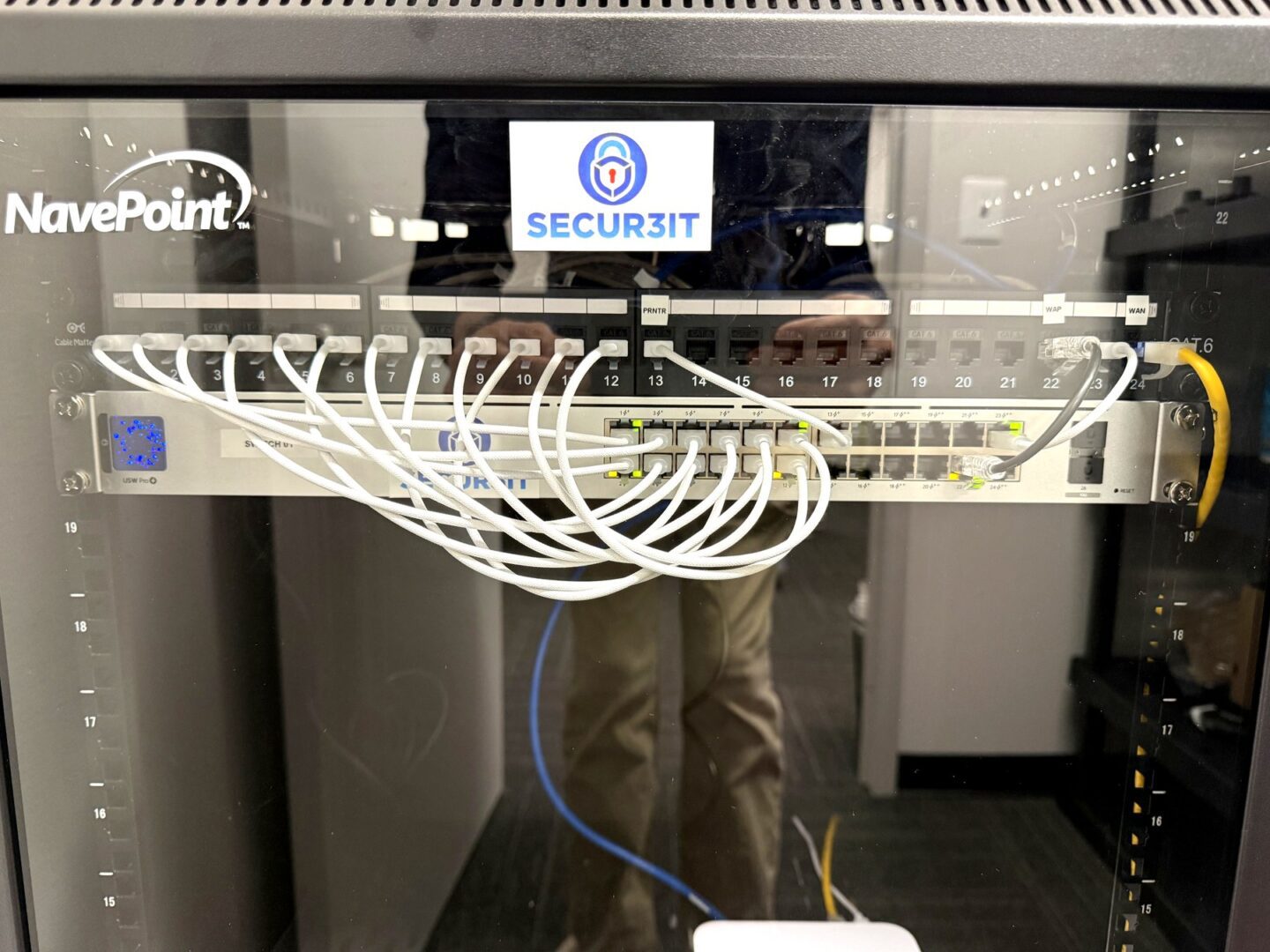 Secur3iT structured cabling and UniFi switch installation in a NavePoint network rack
