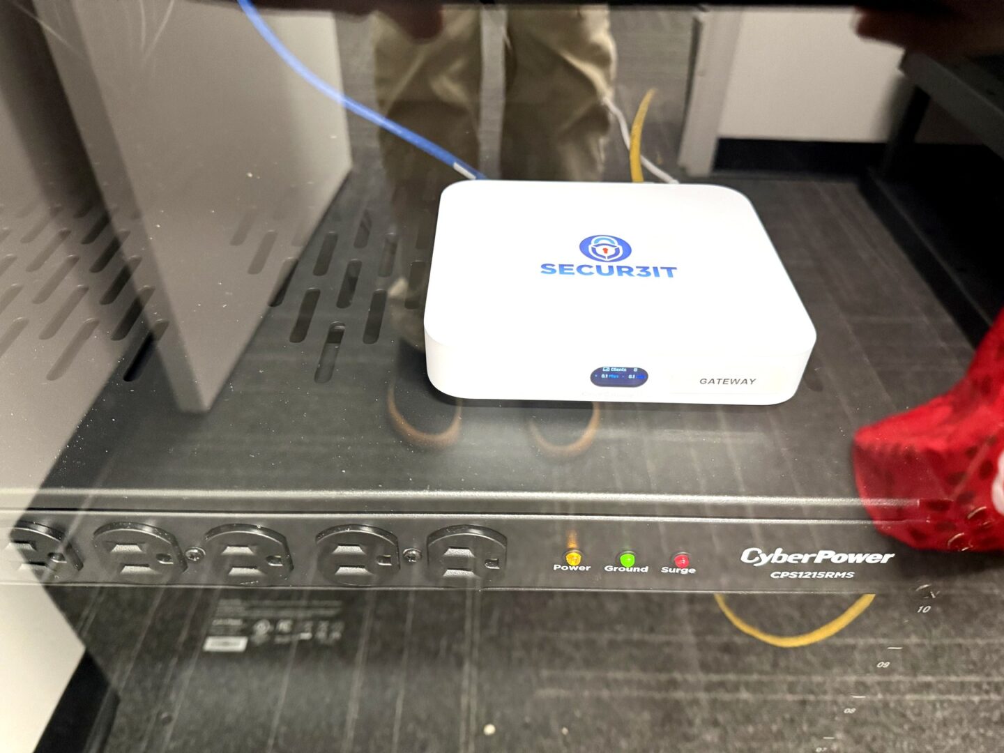 Secur3iT branded Ubiquiti UniFi Cloud Gateway Max installed in network rack